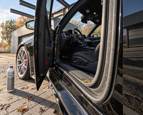 Koch-Chemie Plast Star next to the open door of an Audi RS 5 with a dusty, dull door seal before the first frost